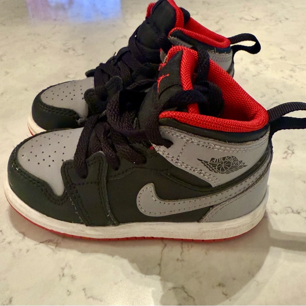 Jordan Kids Black and Gray Sneakers with Red Accents